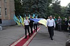 Урочиста церемонія підняття Державного Прапора України та покладання квітів до пам'ятника на честь бійців, які загинули під час виконання військового обов'язку в зоні проведення антитерористичної операції на сході України в Металургійному районі